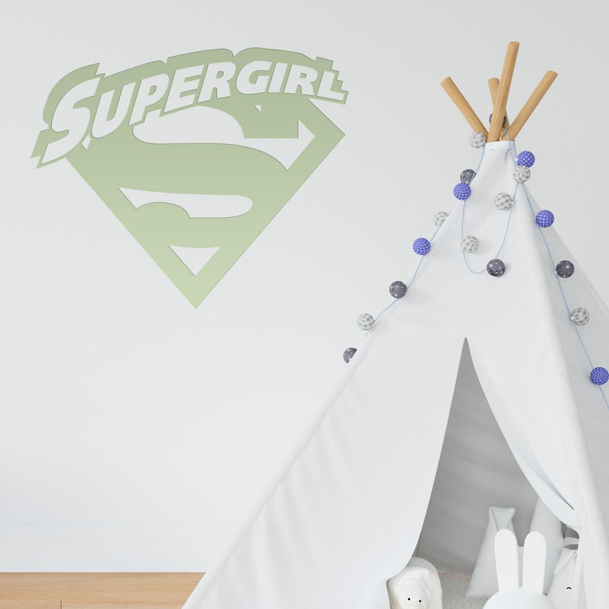 "Supergirl" Wall Art in a Children"s Play Room