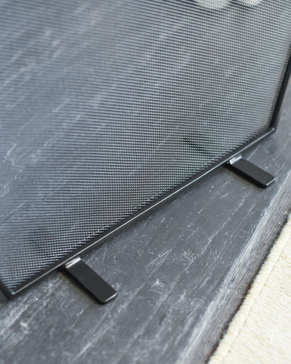 Close Up Of "The Exmouth" Black Curved Fire Guard Feet