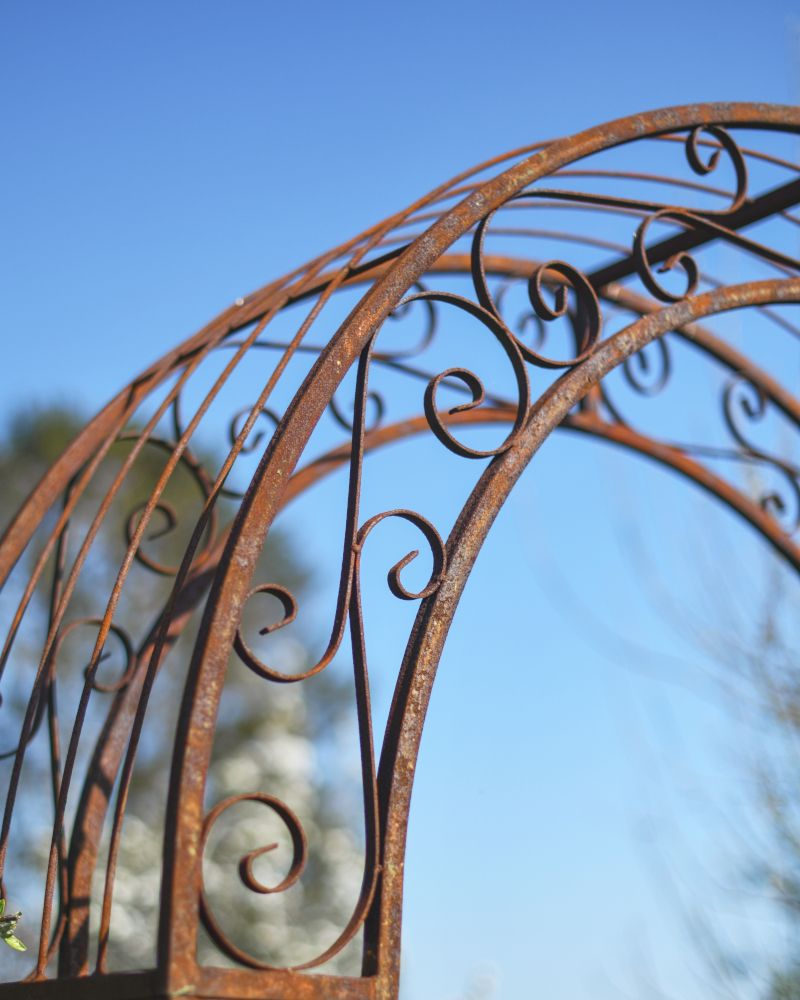 Close-up of the Ornate Scrollwork on the Top of the Rose Arch