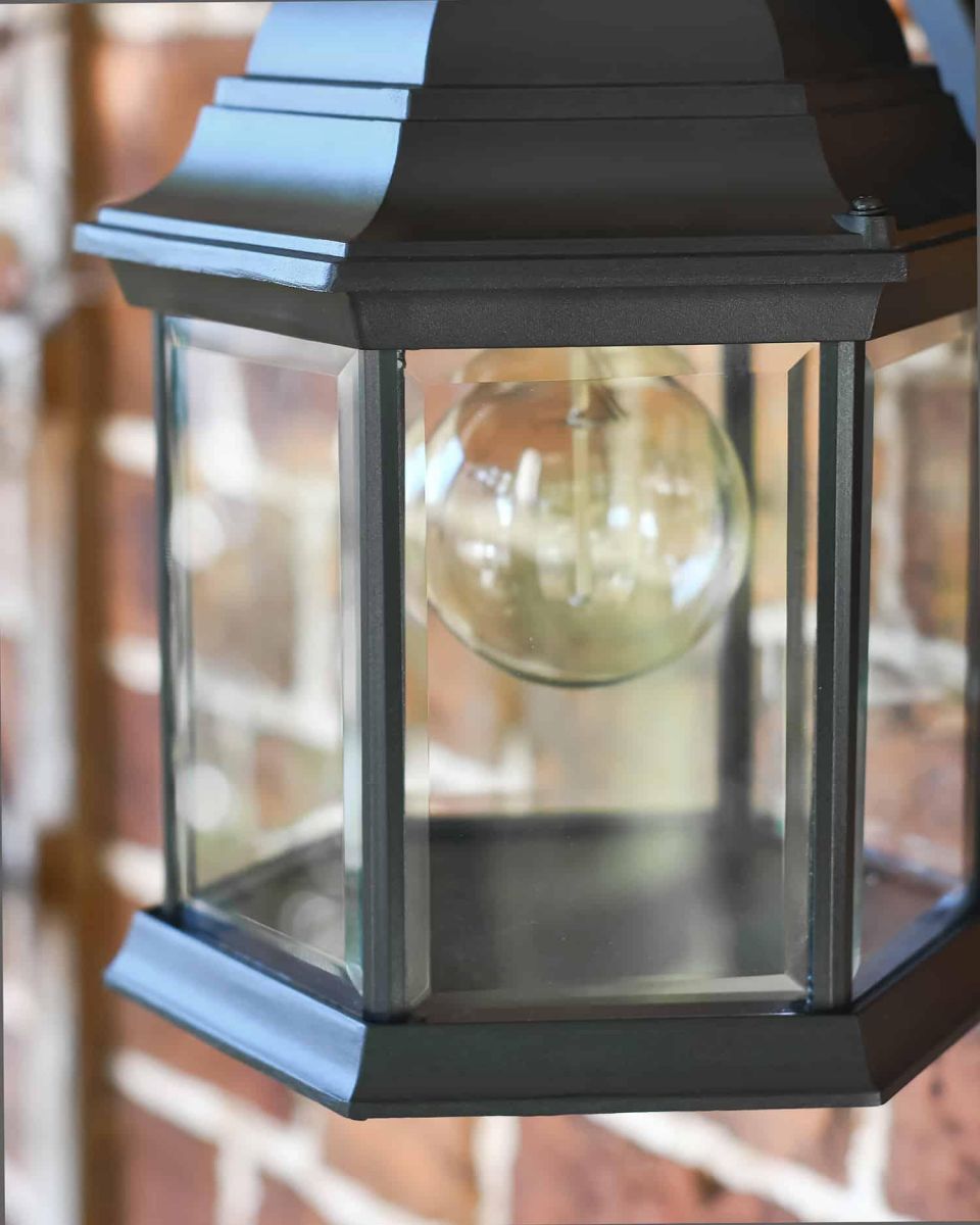 Close-Up of Large Traditional Black "Hexagonal" Victorian Top-Fix Wall Lantern in Situ