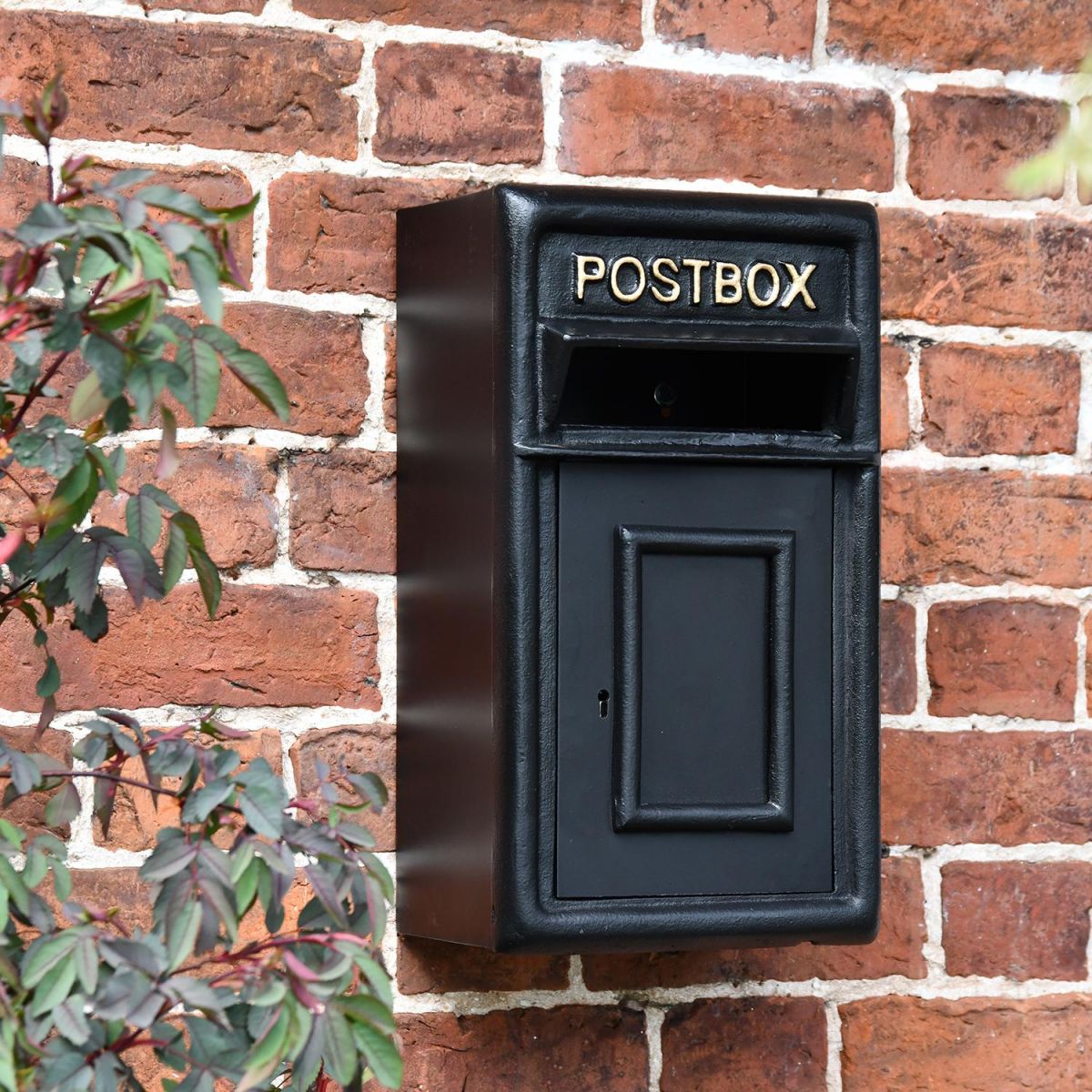 Traditional Black & Gold Wall Mounted Post Box in Situ