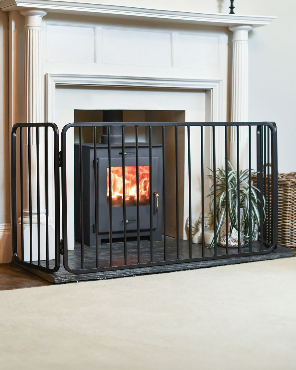 Traditional Large Black Nursery Fire Guard in Situ