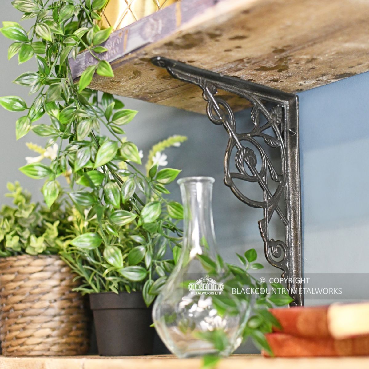 Trellis Iron Shelf Bracket in Situ Holding Up a Wooden Shelf 