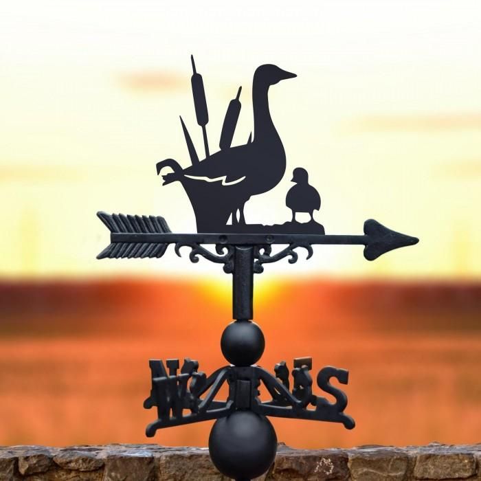Duck and Duckling Weathervane in the Sun Set