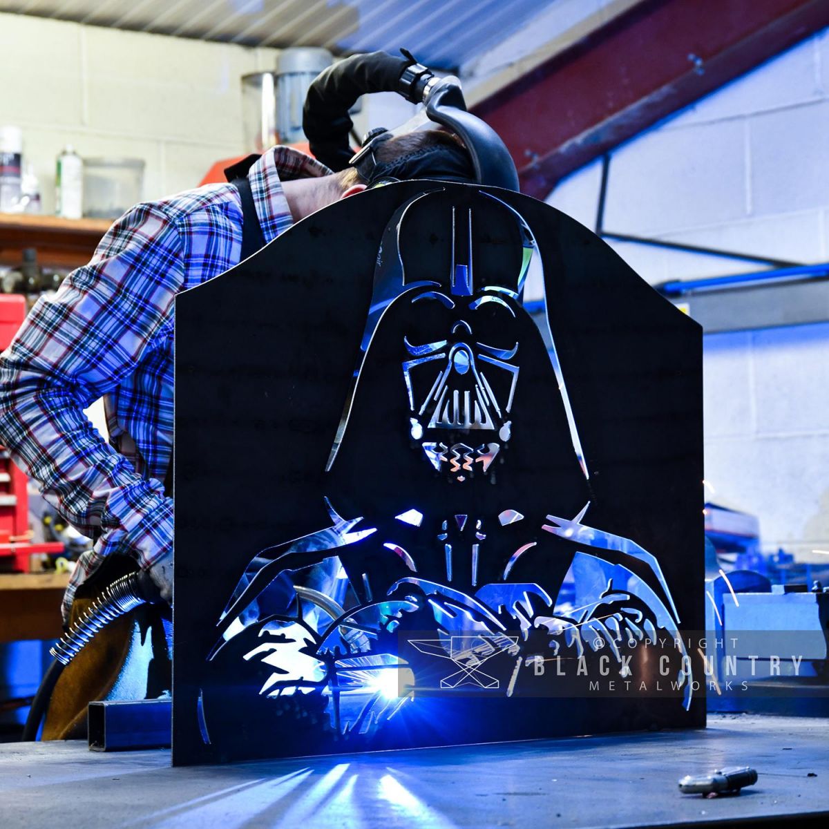 Legs of the Darth Vader Fireguard Being Welded on in Our Workshop