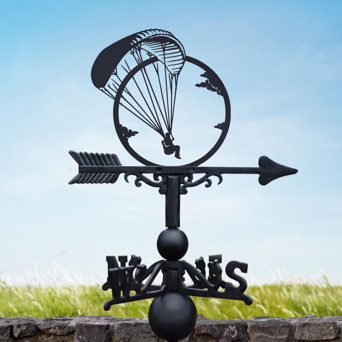 Black Paragliding Weathervane in Open Skies 