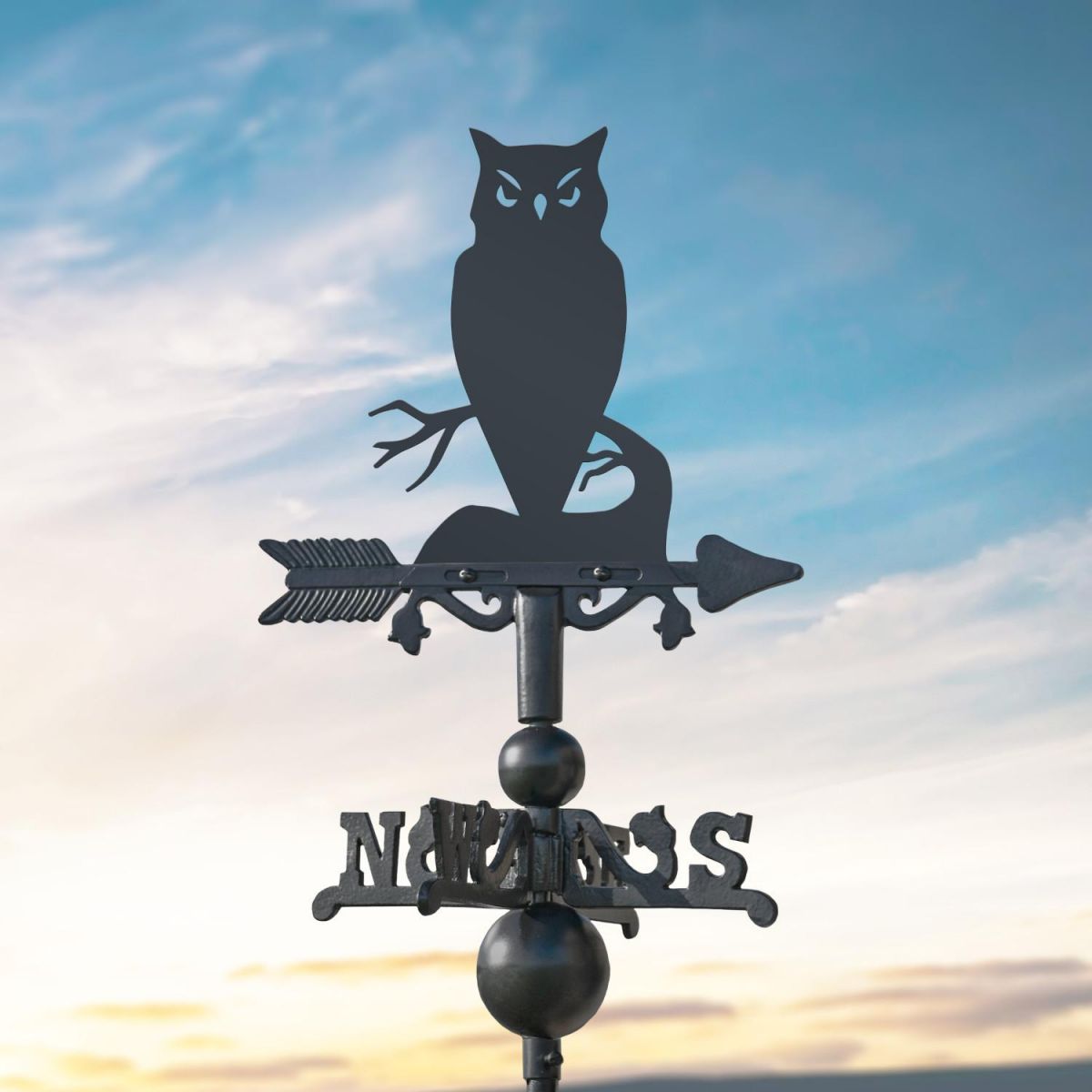 Owl on Miniature Weathervane at Dusk