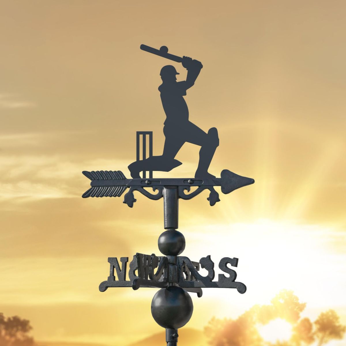 Cricketer on Miniature Weathervane at Sunset