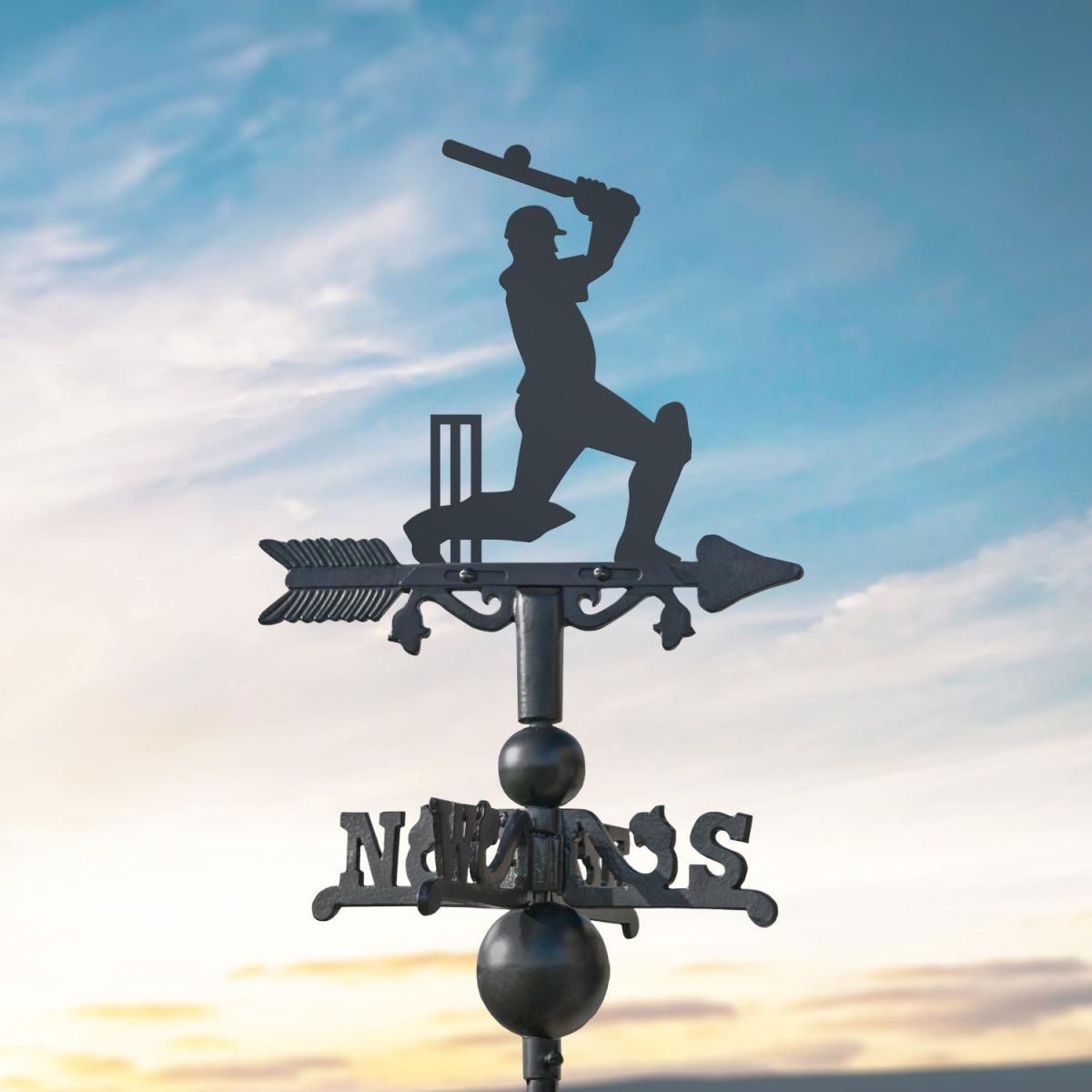 Cricketer on Miniature Weathervane at Dusk
