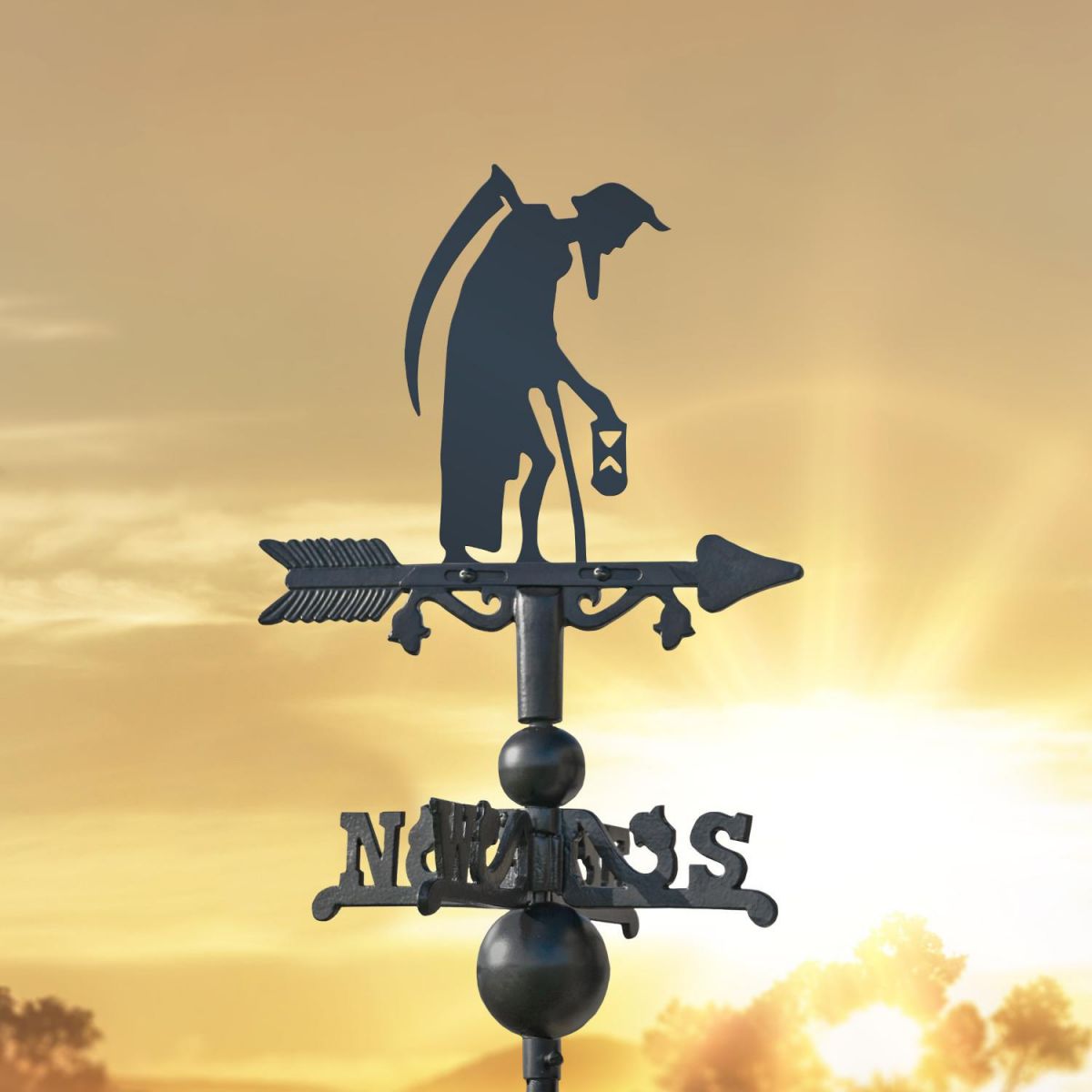 Old Father Time on Miniature Weathervane at Sunset