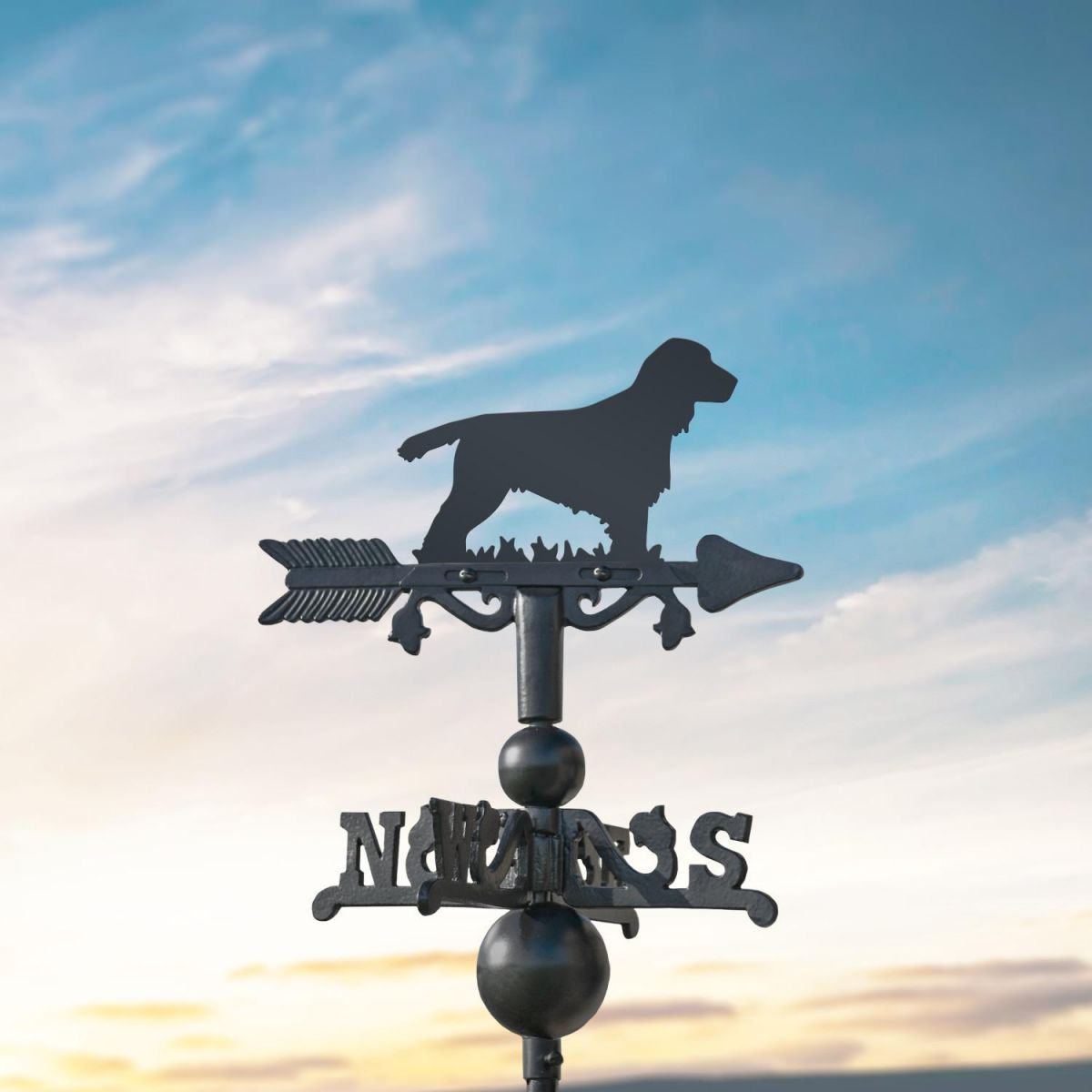 Cocker Spaniel on Miniature Weathervane at Dusk