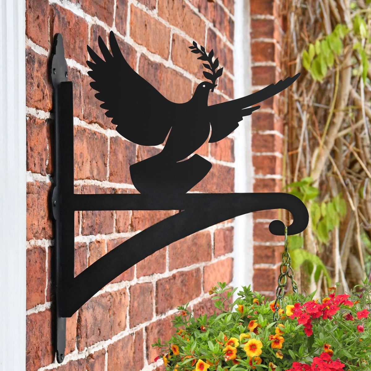 Dove of Peace Hanging Basket Bracket in Situ on a Brick Wall