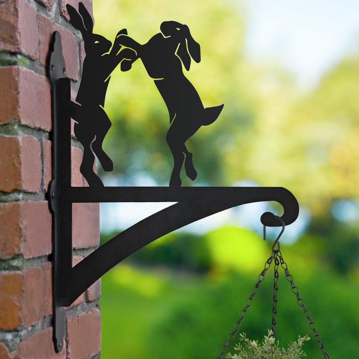 Boxing Hares Hanging Basket Bracket in Garden