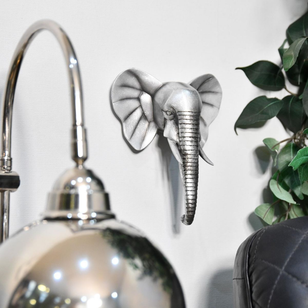 Silver Elephant Head Wall Art mounted to wall