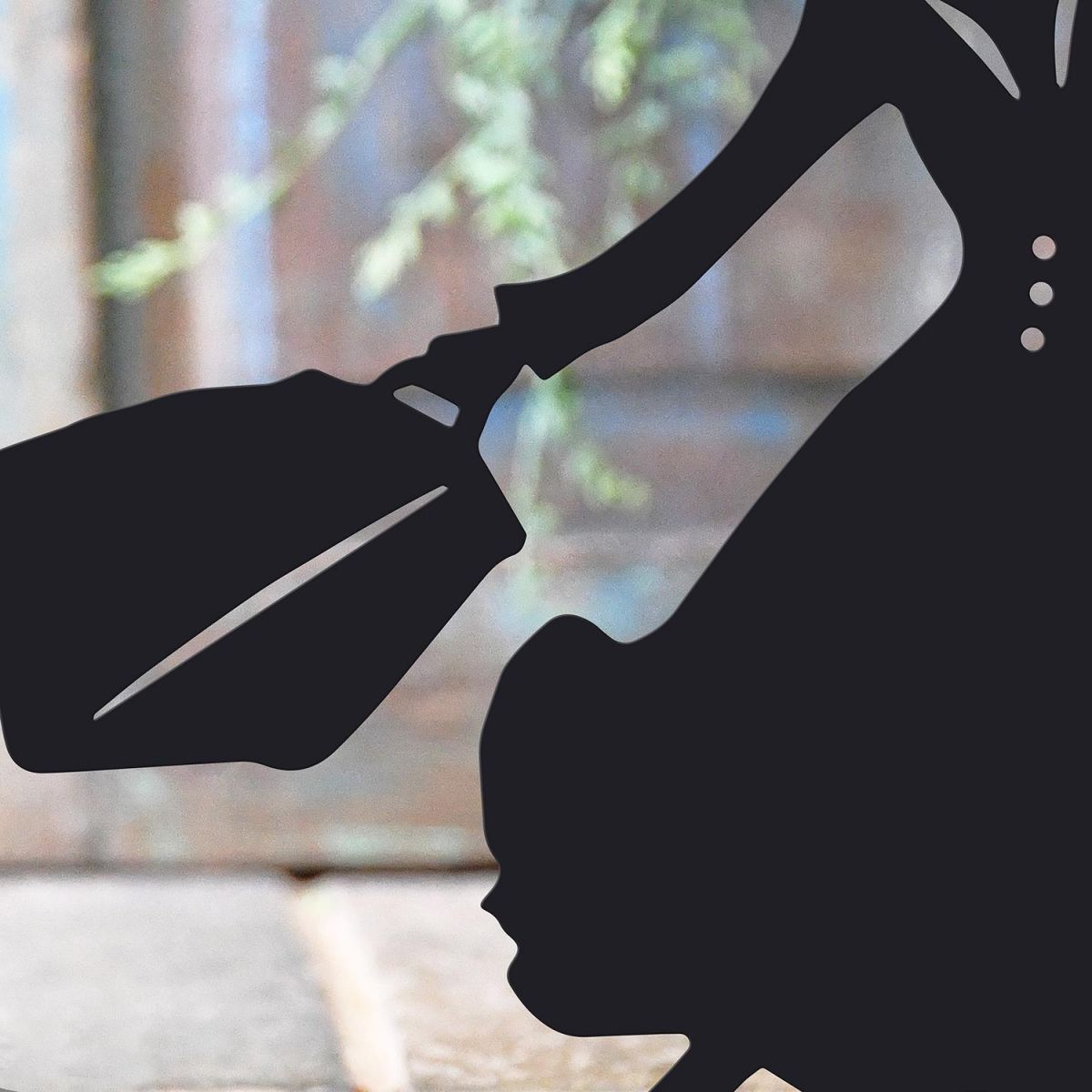 Close-up of the Black Finish on the Mary Poppins Iron Door Stop