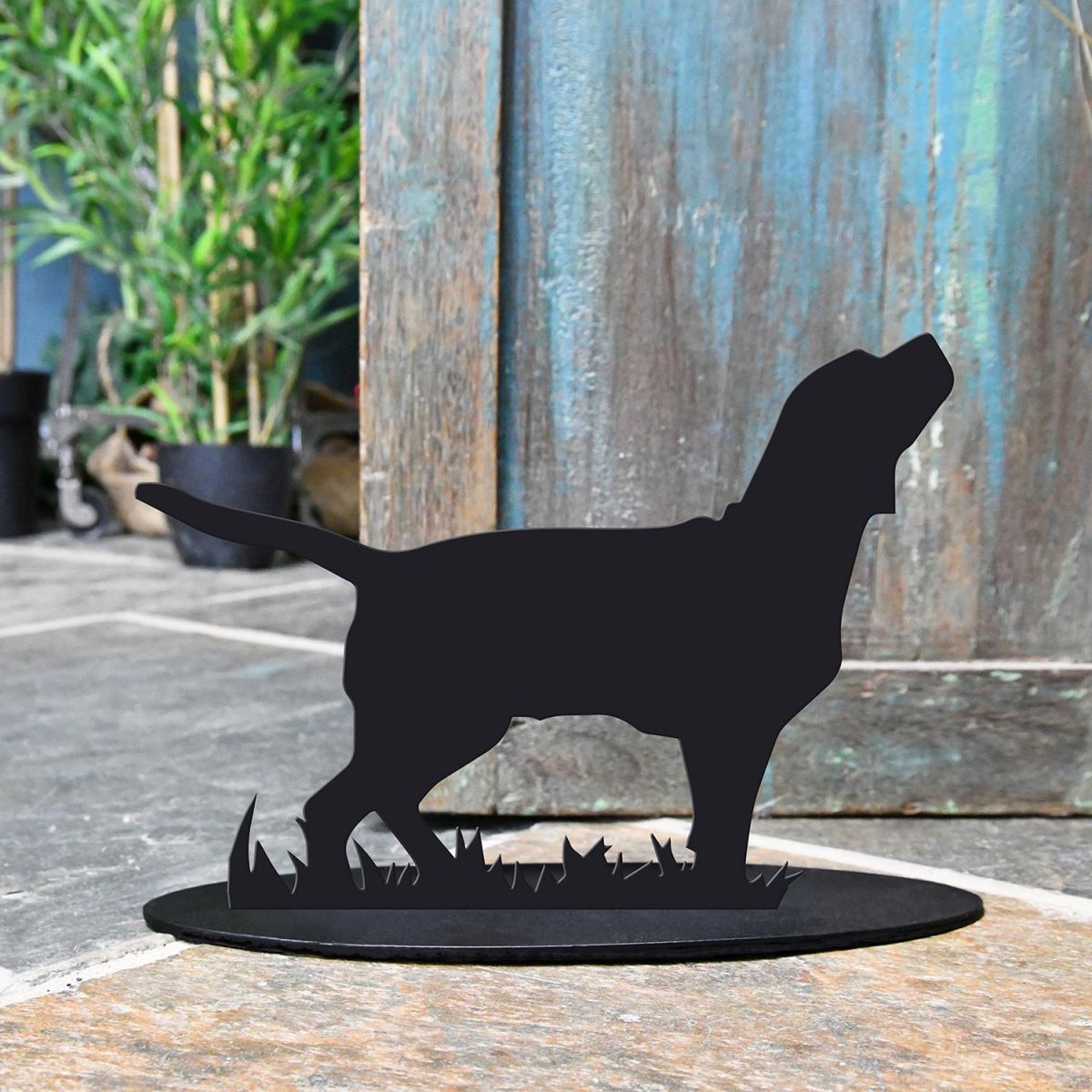 Beagle Iron Door Stop Next to a Rustic Blue Door