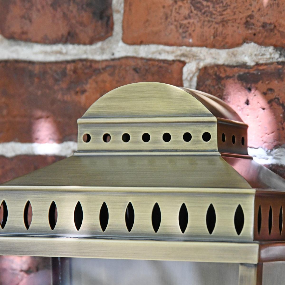 Close up of Georgian wall light with oval and circle embellishments