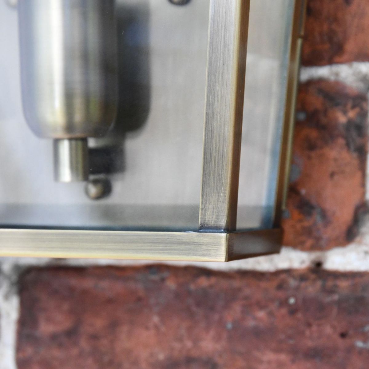 Close up of wall light frame and integrated bulb holder 