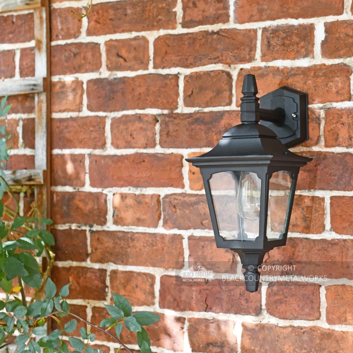 "Moorside" Traditional Top Down Black Wall Lantern in Use