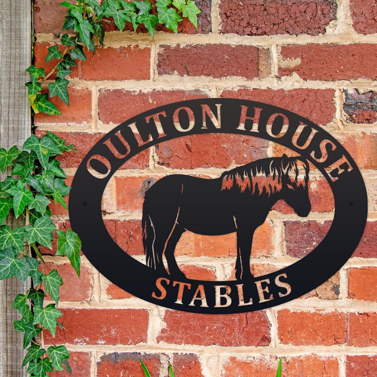 Shetland Pony Iron Oval House Sign on a Brick Wall