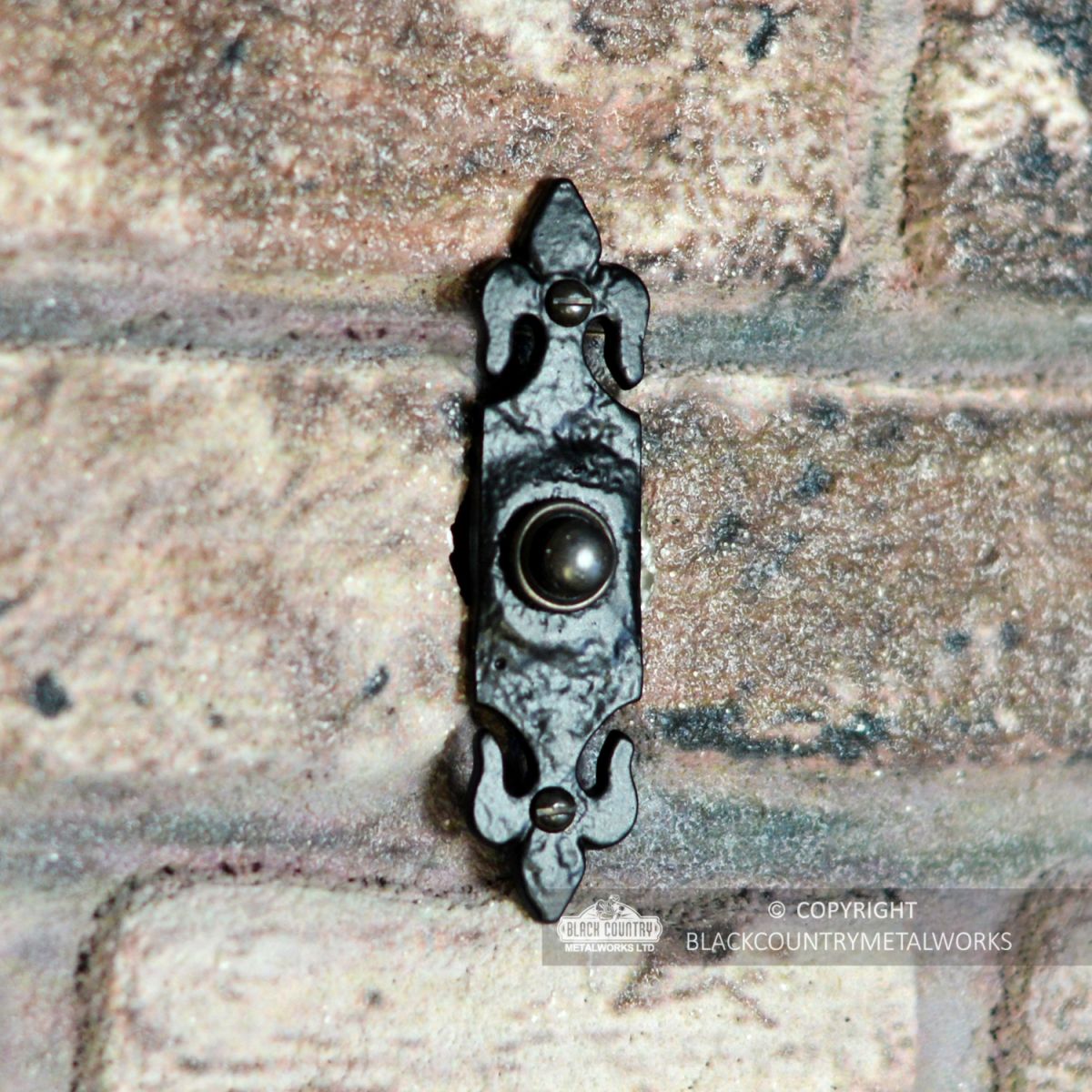  Iron Fleur De Lys Bell Push in Situ on a Wall