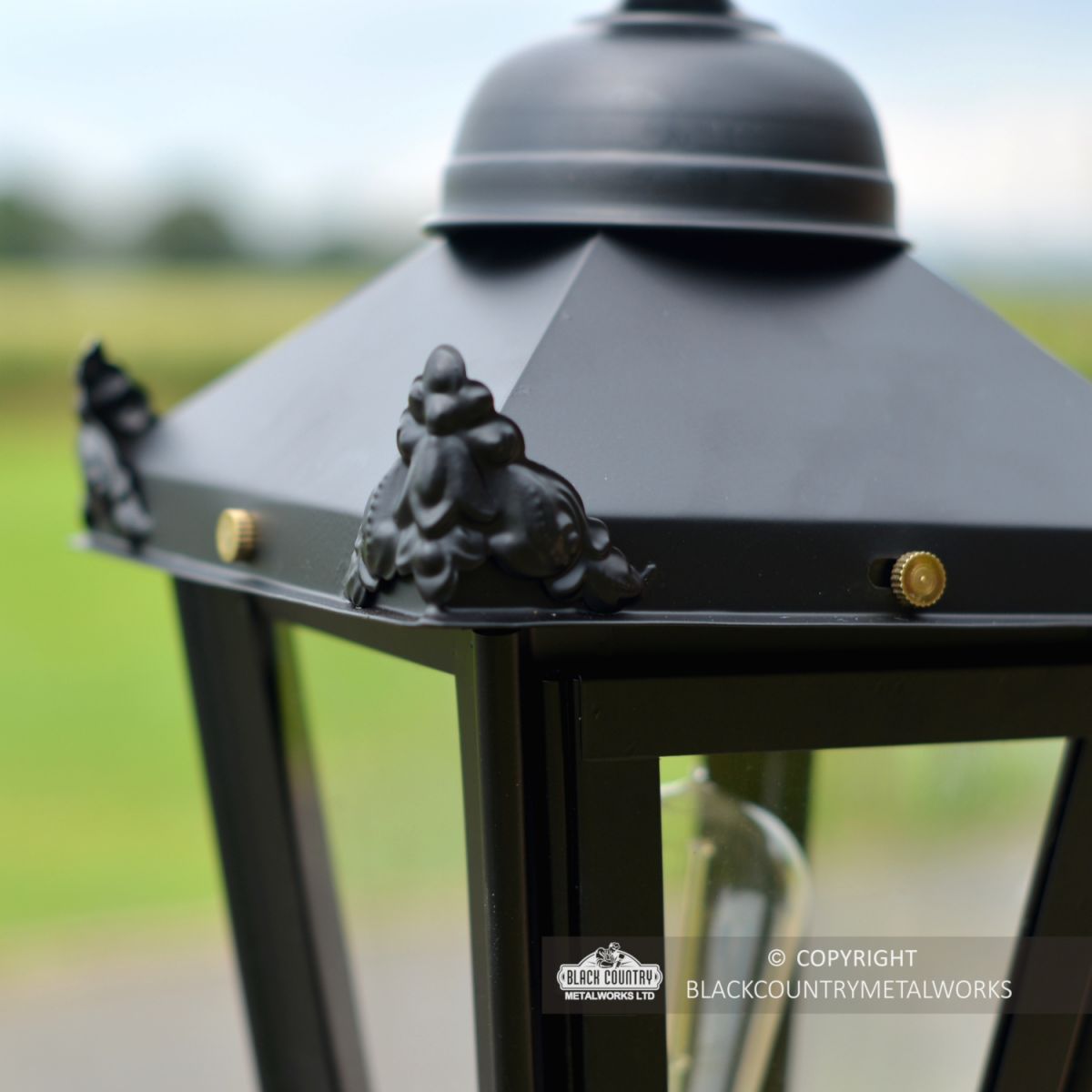 Decorative Wings on the Lid of the Lantern