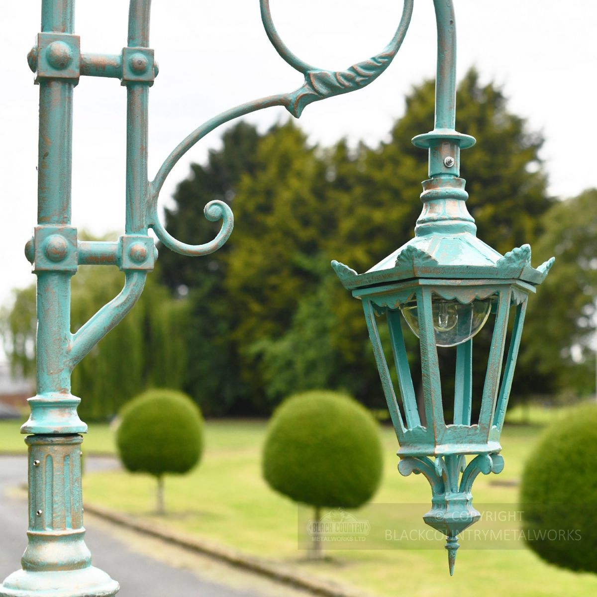 Vintage Blue Hexagonal Lantern and lamp post scroll work