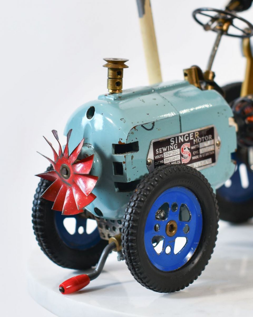 Close up of Vintage Farmer Recycled Metal Sculpture Bonnet