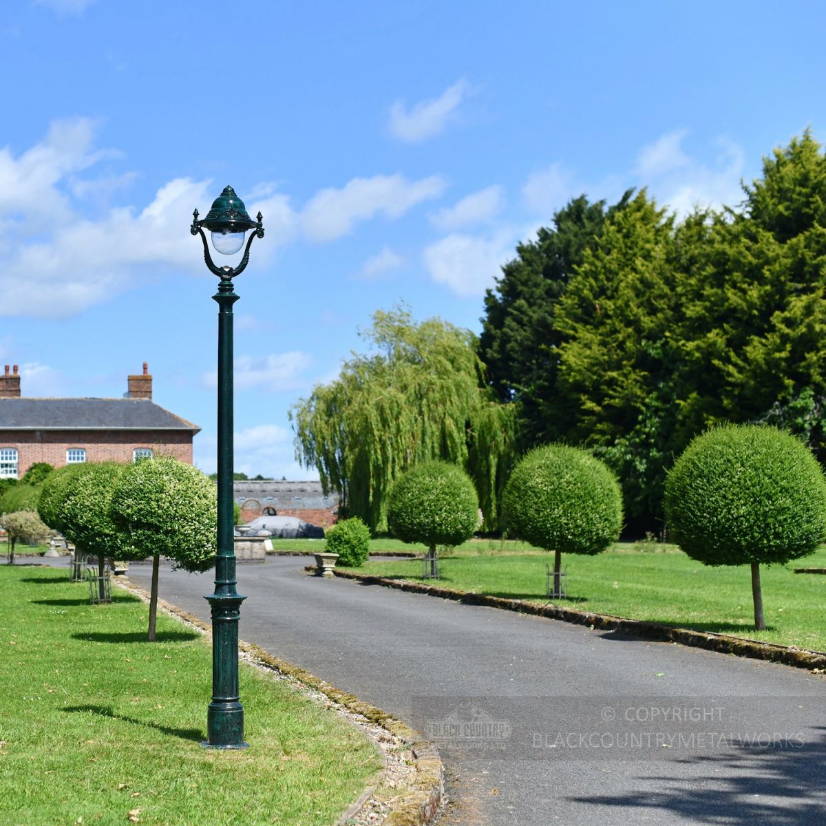 Vintage Green Opulent Cast Iron Lamp Post Installed In Period Driveway
