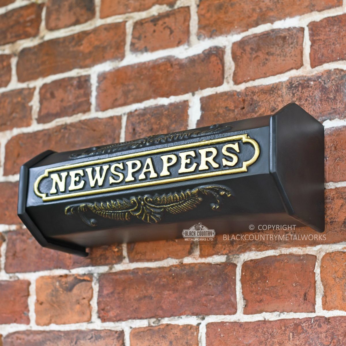 Wall Mounted Newspaper Tube In Black and Gold