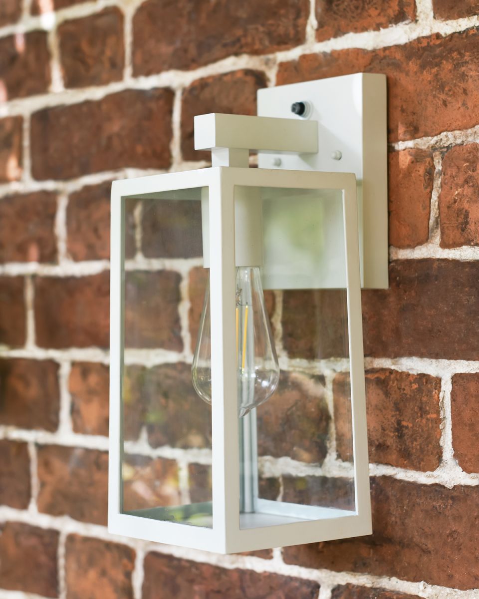 White Wall Light in Situ on a Brick House