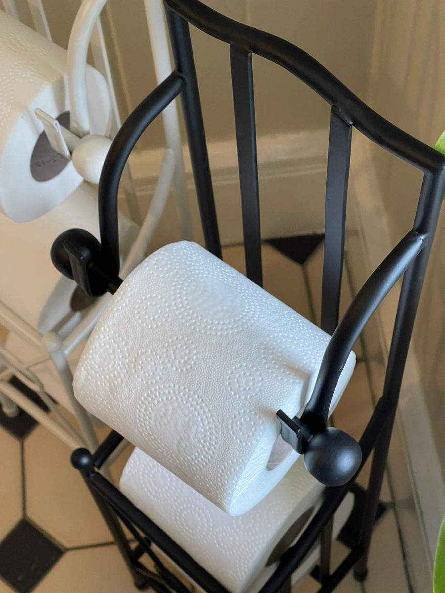 "Wraymond" Floor Standing Black Toilet Roll Holder Holding a Toilet Roll