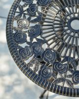 Close up of intricate pattern on cast aluminium table top