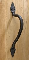 Door pull handle on wood door