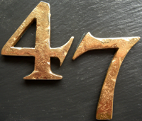 rustic copper numbers on slate plaque