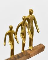Detailed close up of people on home decor sculpture
