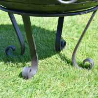Close up of scrolled stand 