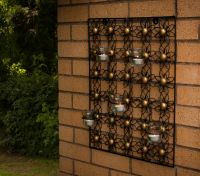 Flower wall art with candle holder