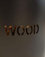 Close-Up of "WOOD" Lettering on "Brettington" Powder Coated Iron Wood Basket 