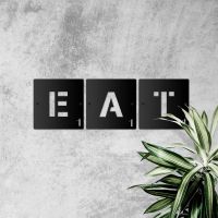 "EAT" Black Scrabble Square Letters in Situ in the home