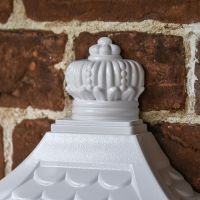 Ornate Finial on the Top of the “Frostine" White Huntington Wall Mounted Post Box