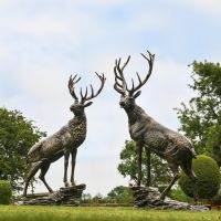 Pair of “Renwick” Stag on Rock Sculptures in Situ