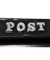 The Wording "POST" on the Top of the Post Box