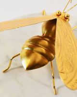 Close up of body and wings detail in recycled metal art sculpture