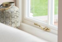 Aged Brass Hammered Espag Window Handle - Left Handed in Use