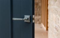 Aged Pewter Unsprung Lever Door Handle on Square Rose in Situ