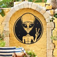 Peace Sign Alien Wall Art in Situ on a Yellow Wall