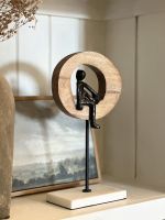 Back view of aluminium, mango wood and marble art sculpture