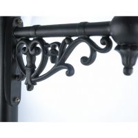 Close-up of the Ornate Scroll Work on the Corner Bracket