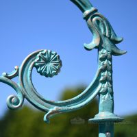 Antique Blue Cast Iron Lamp Post Bracket Close Up